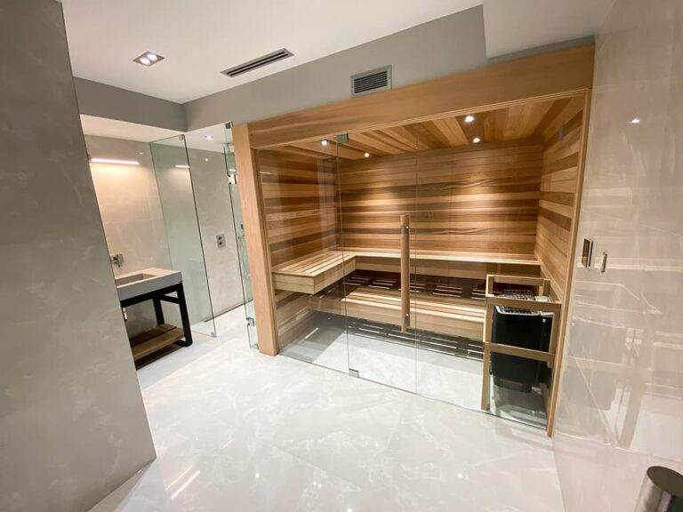 A recently renovated sauna area by Houses to Homes Design
